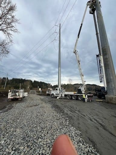Crane and rigging crew completing an industrial equipment installation